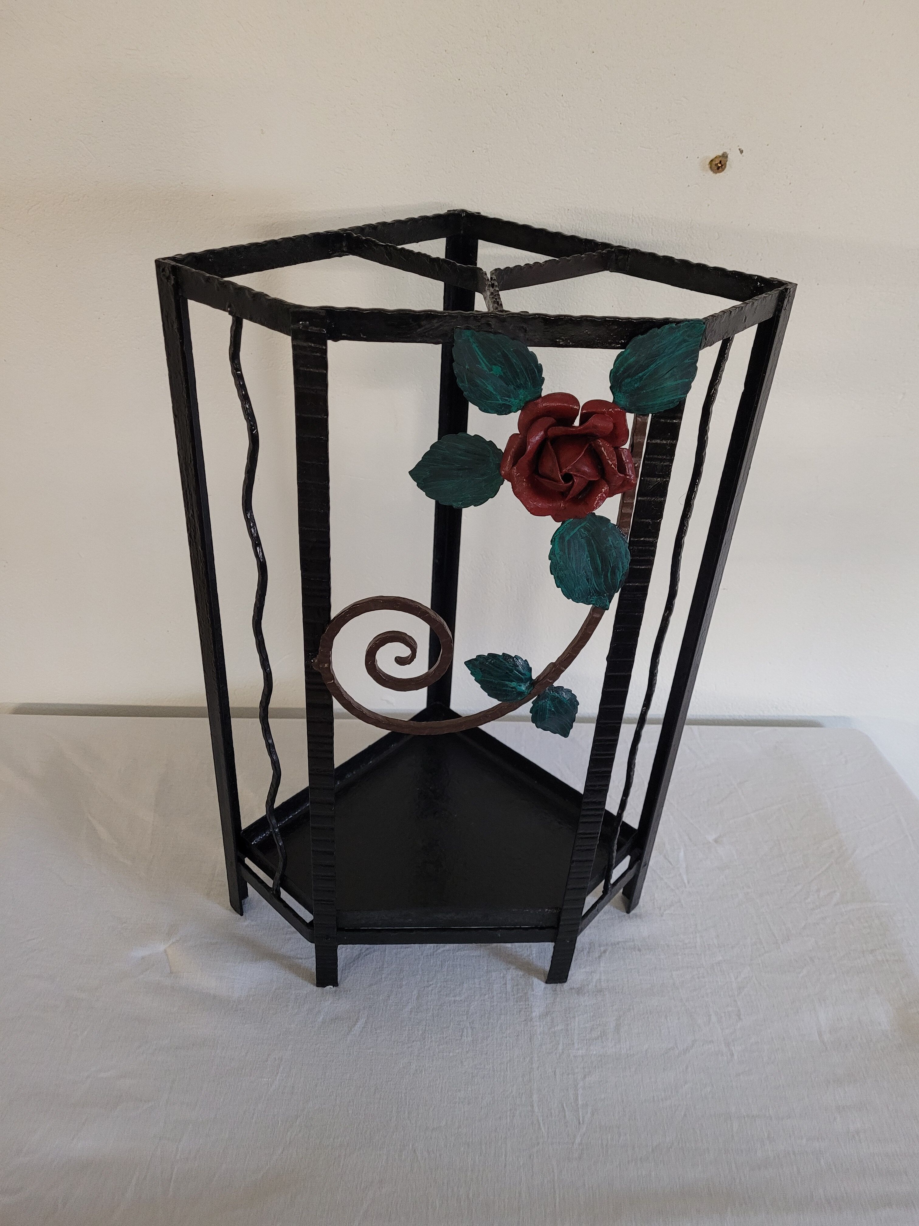 Wrought iron umbrella door