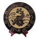 Dauphinois plate in glazed terracotta from around 1950 with dolphin decoration.