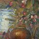 Still life with pink flowers and blue pots.