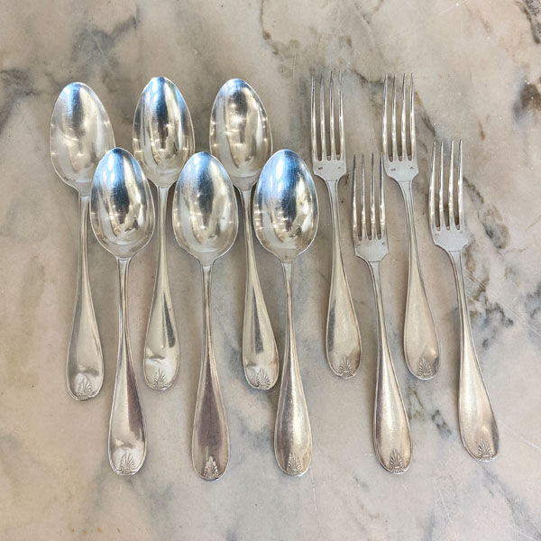 Large spoons and forks, silver metal