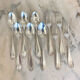 Large spoons and forks, silver metal