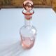 Vintage pink glass bottle