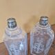 Pair of old engraved and frosted glass bottle vases.