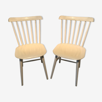 Paire de chaises vintage à barreaux piétement compas