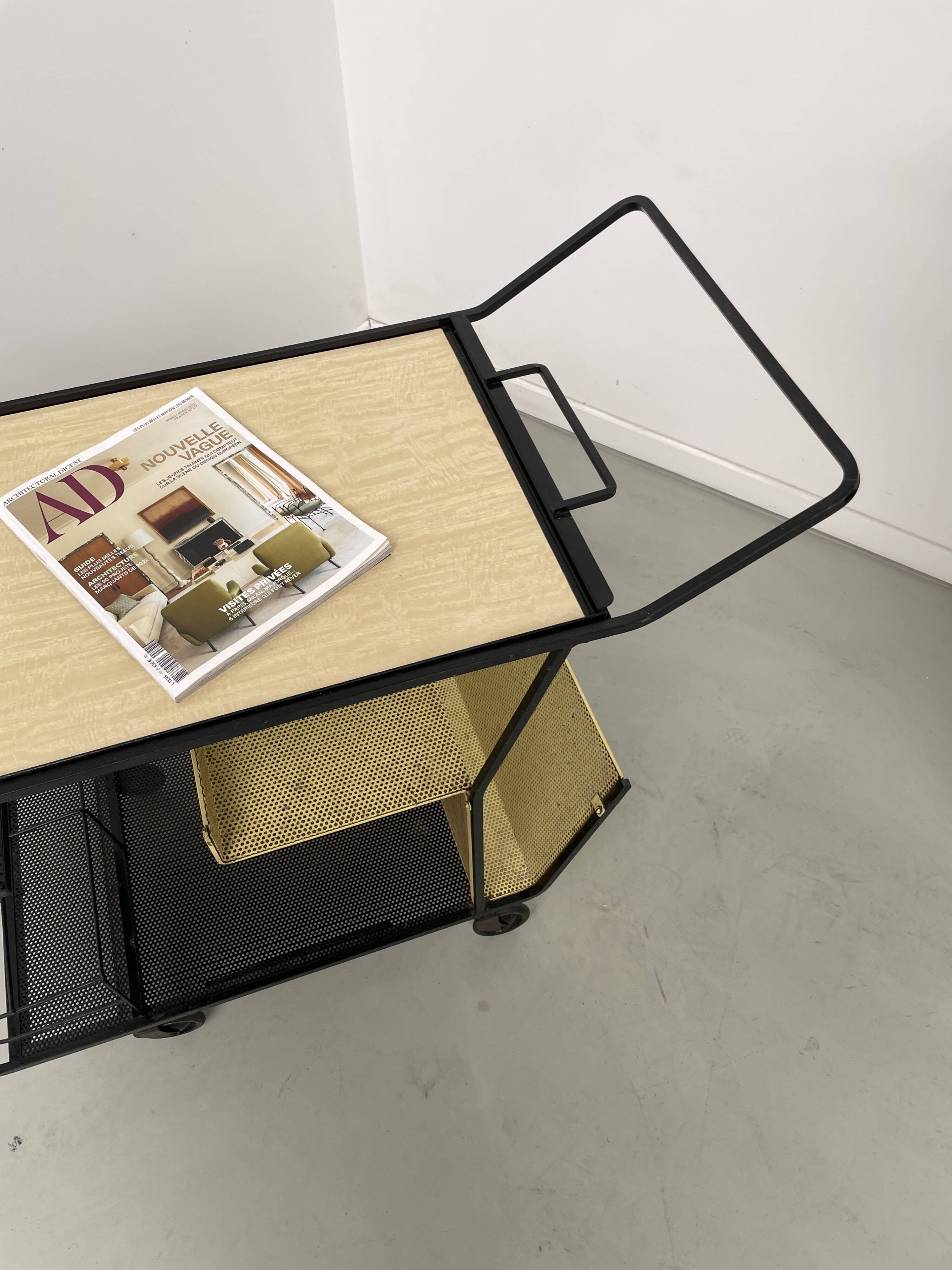 Perforated metal serving trolley in the Mathieu Matégot style