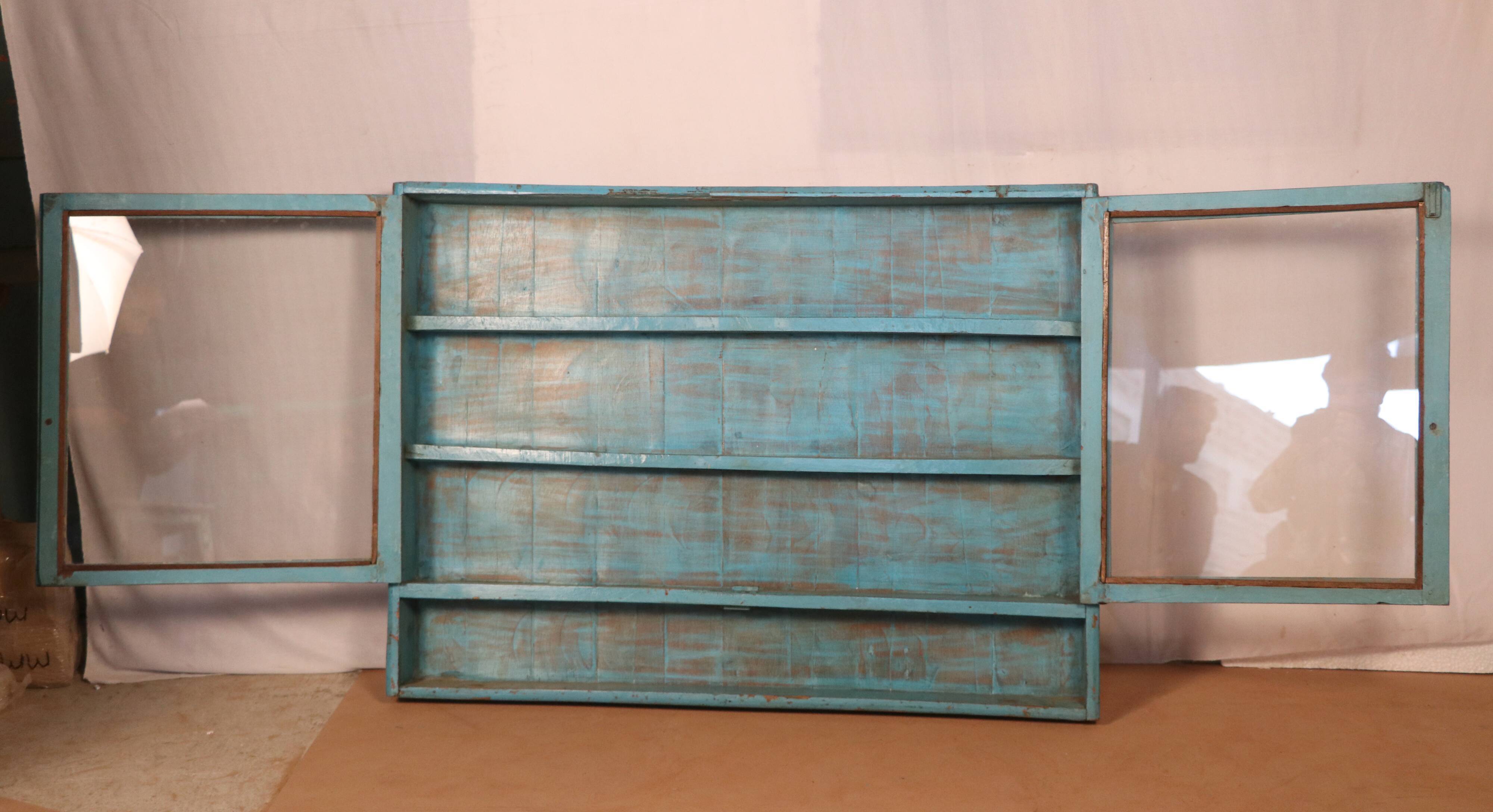 Old showcase in original blue patina Burmese teak