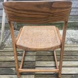 4 magnificent Baumann sled chairs, with caning.