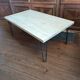 Coffee table in solid bamboo with steel legs.