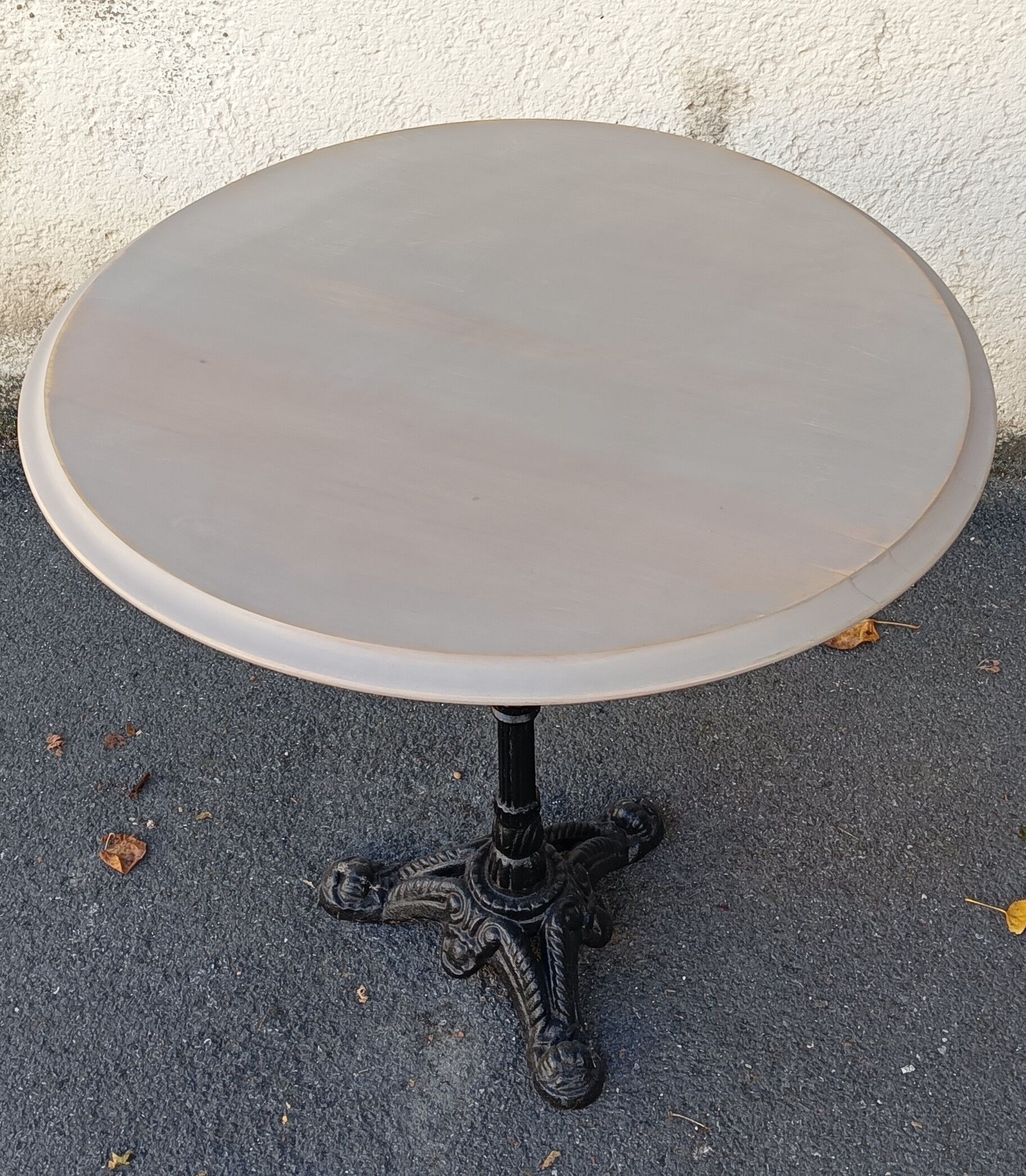 Round wooden bistro table
