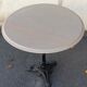 Round wooden bistro table