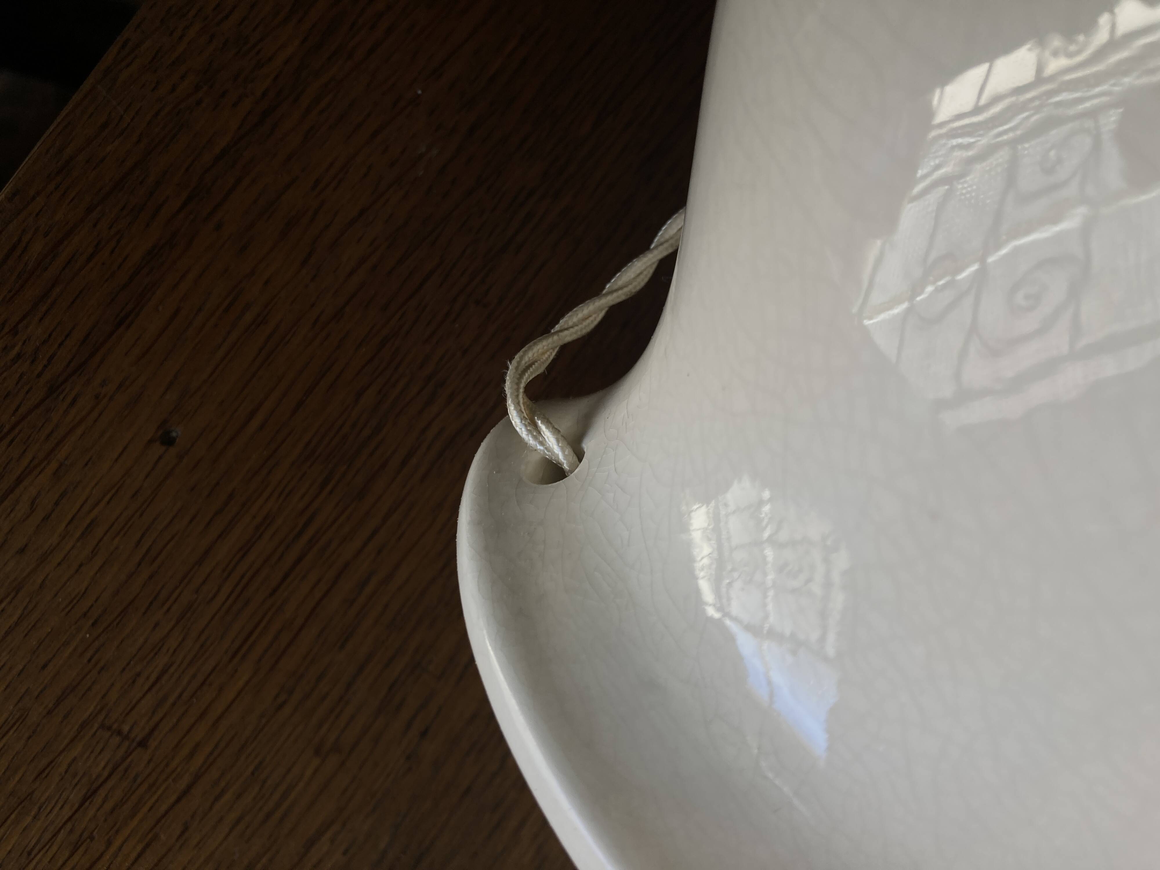 Neo-classical baluster lamp in cracked white earthenware from the 1970s.