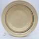 6 deep plates with fine blue and brown rim decorations.