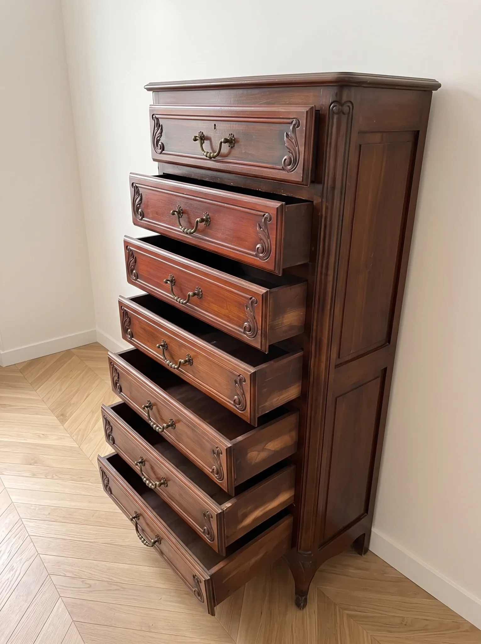 Louis XV style chest of drawers in dark wood with 7 drawers