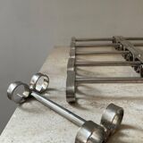 Series of 12 vintage stainless steel knife holders