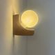 Pair of vintage wall lights, wood and opaline glass, France, 1970
