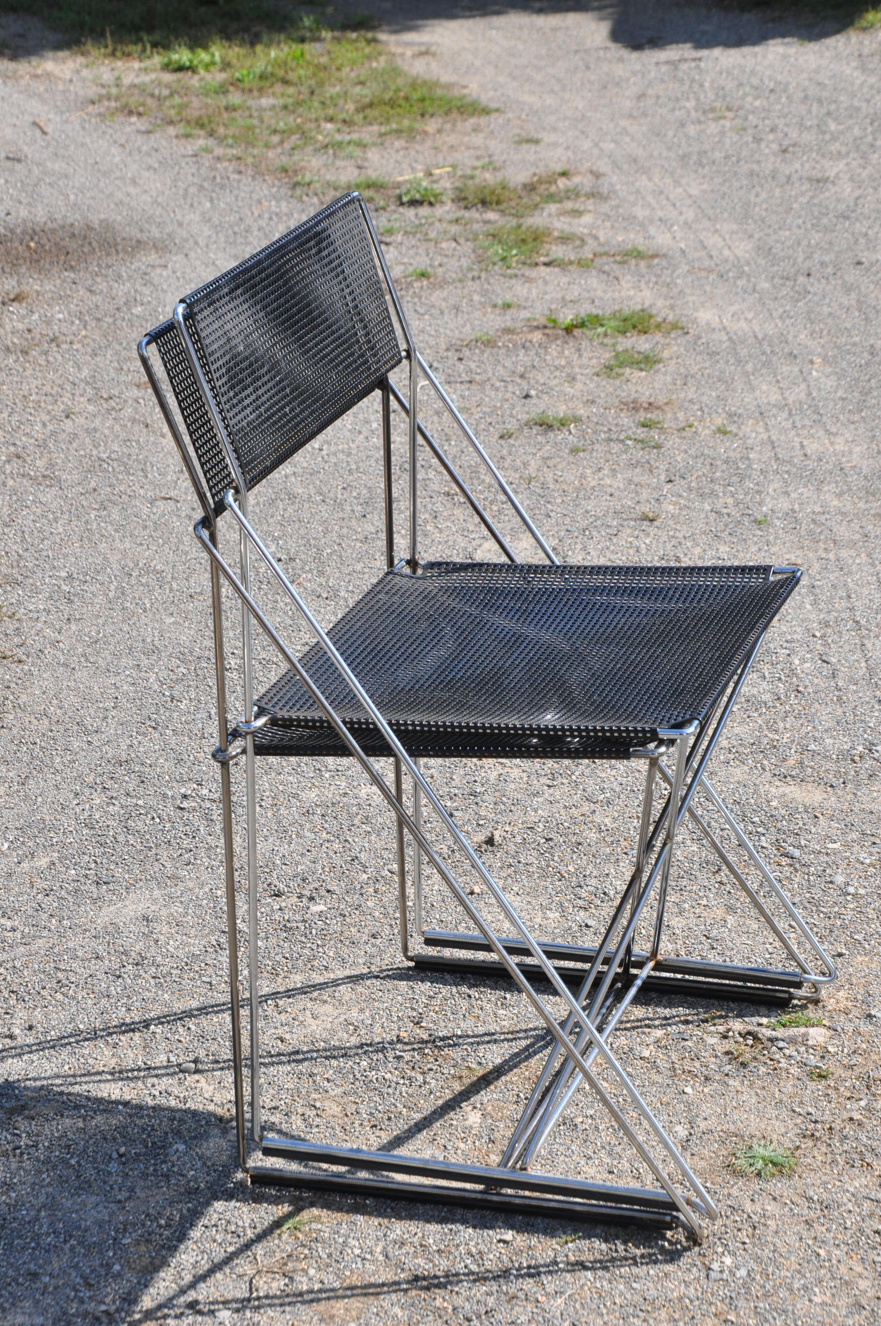 Nuova x line omli chairs by Niels Jørgen Haugesen