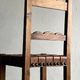 2 brutalist carved wood dining chairs with leather seat | The Netherlands | 1970s
