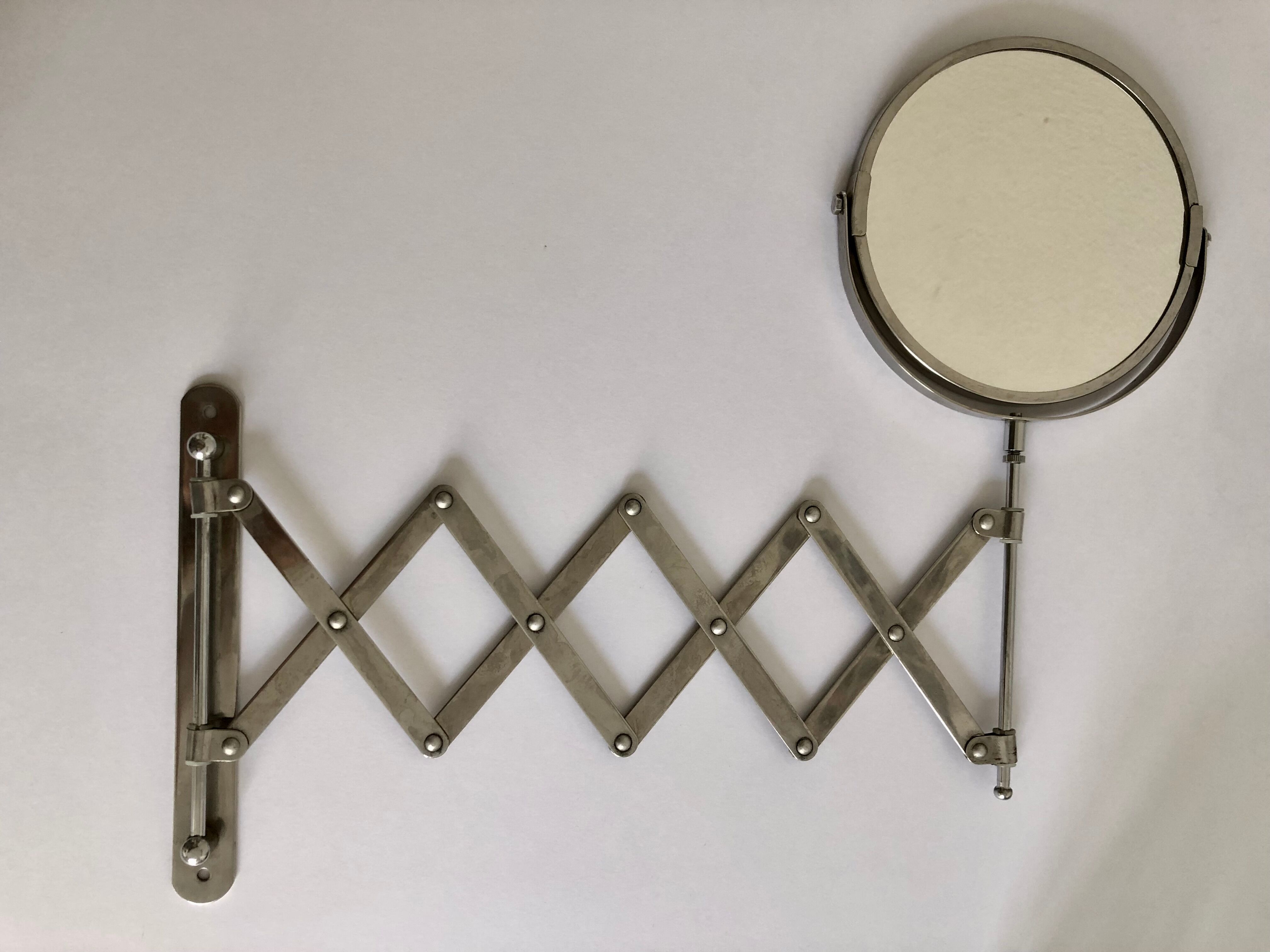 Extendable wall mirror