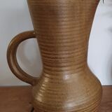 High pitcher in sandstone