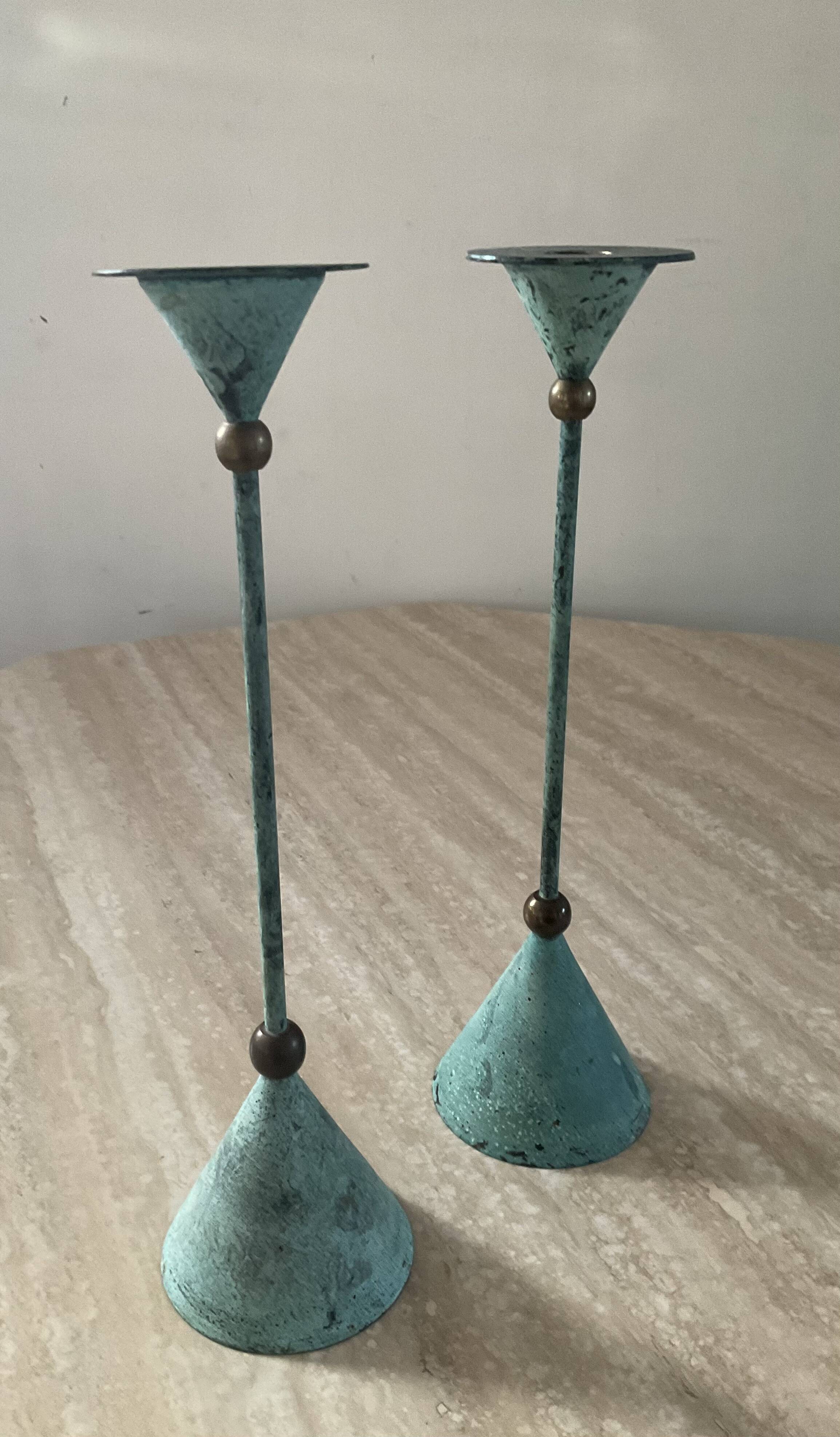 Pair of vintage brass and metal candlesticks