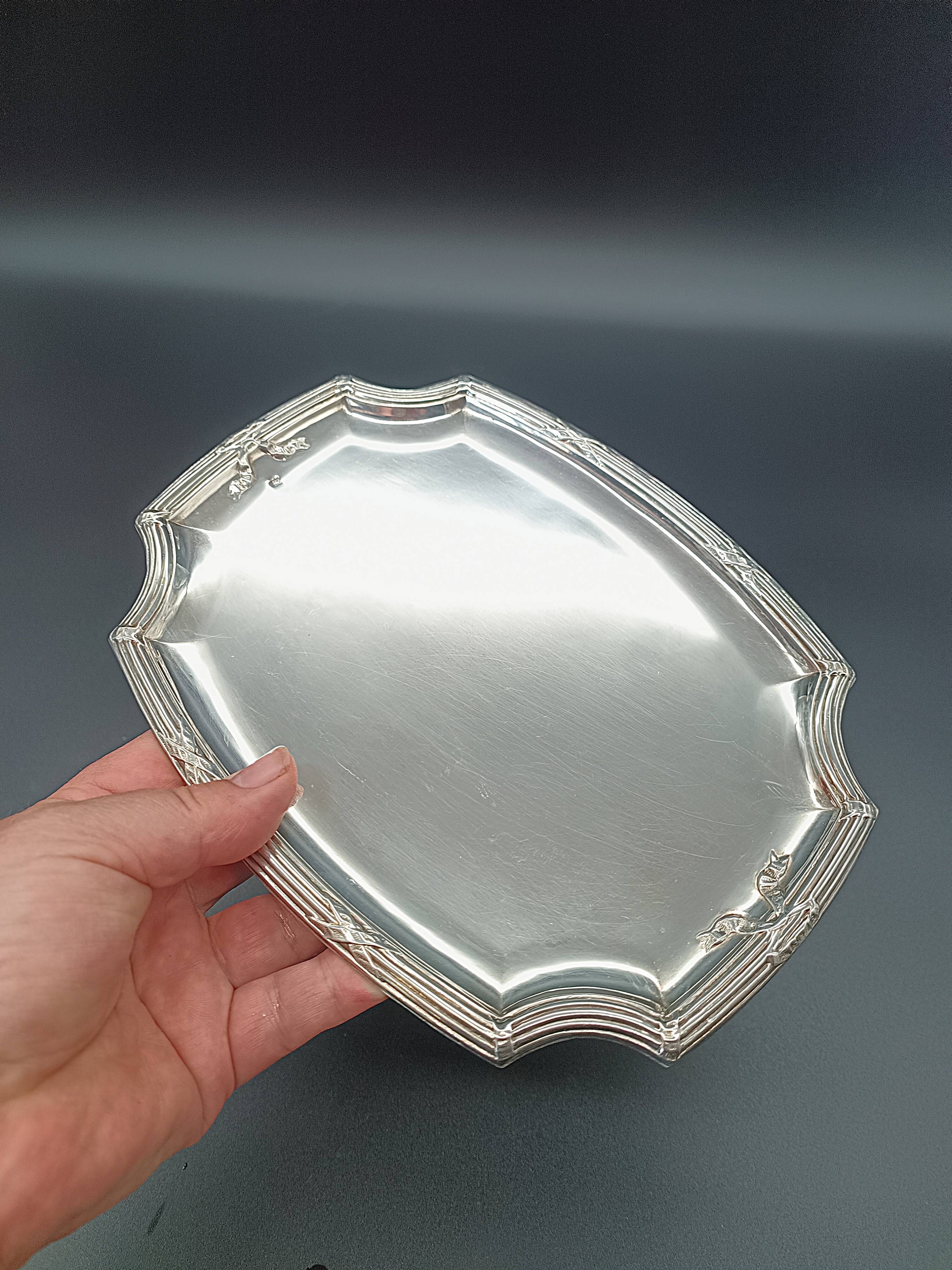 Refined small serving tray or rectangular catch-all with rounded corners.