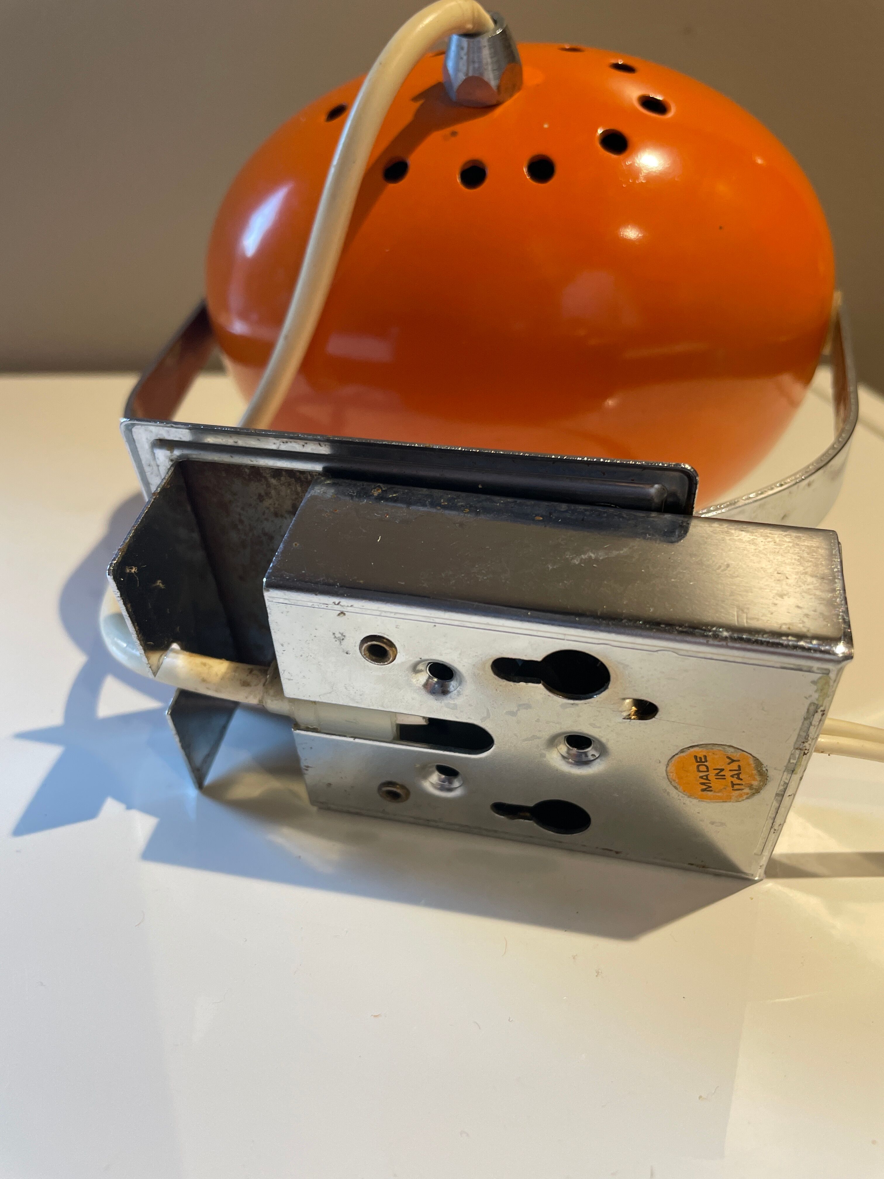 Orange eye ball wall lamp