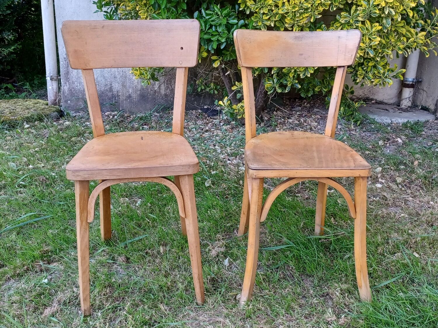 Pair of mismatched vintage bistro chairs