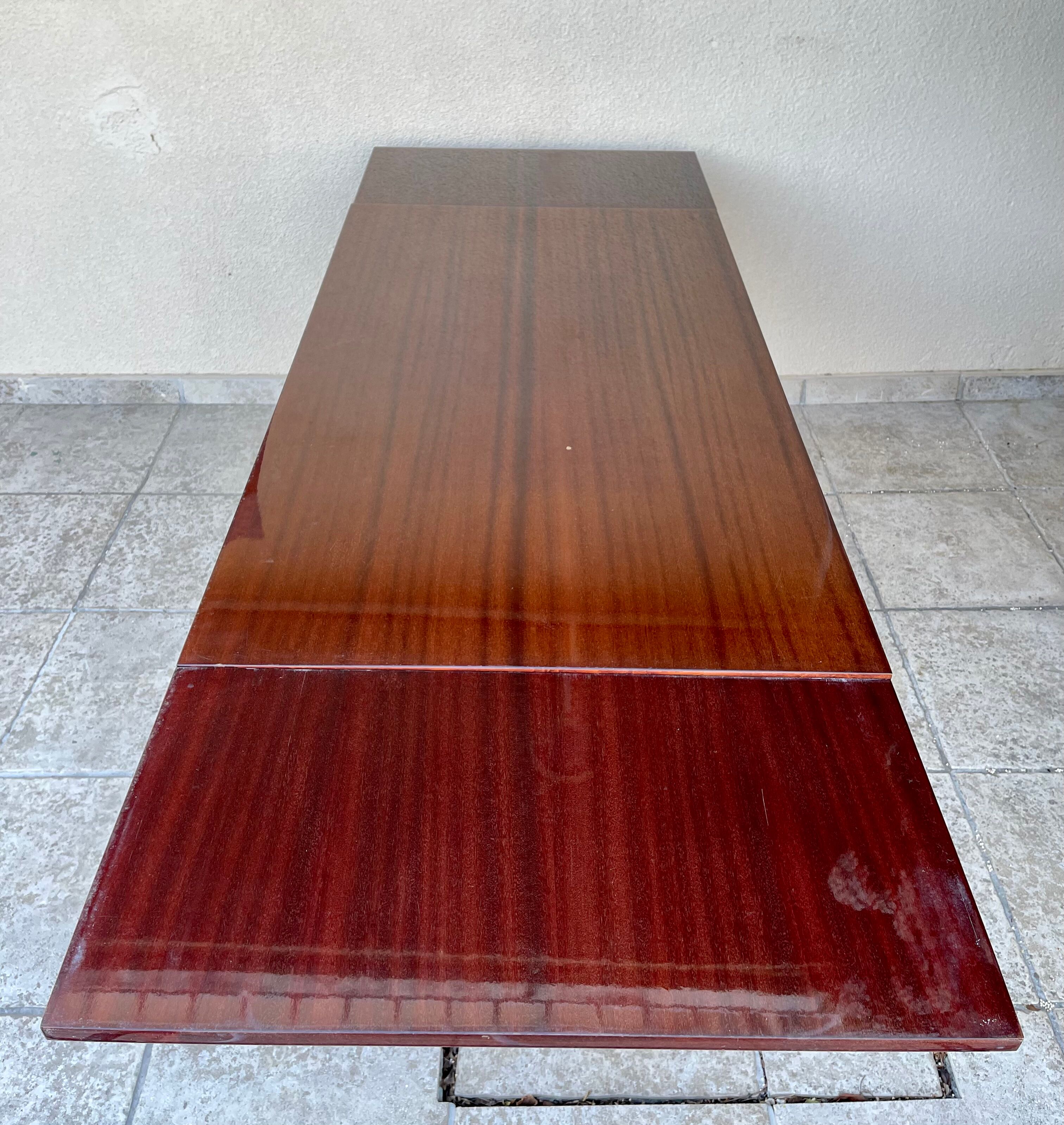 Mahogany dining table with extension cords