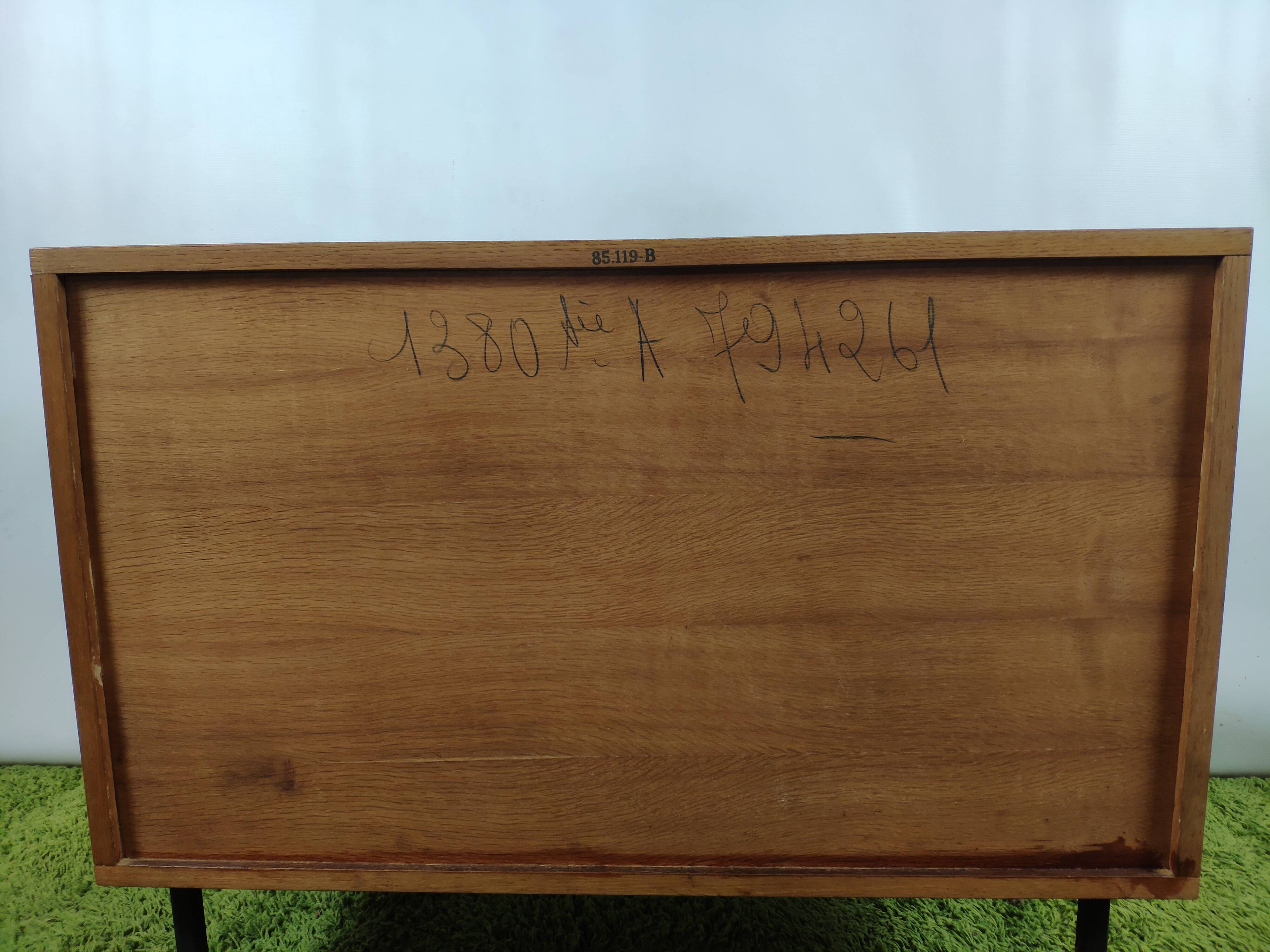 Wooden chest of drawers with gilded handle