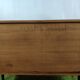 Wooden chest of drawers with gilded handle