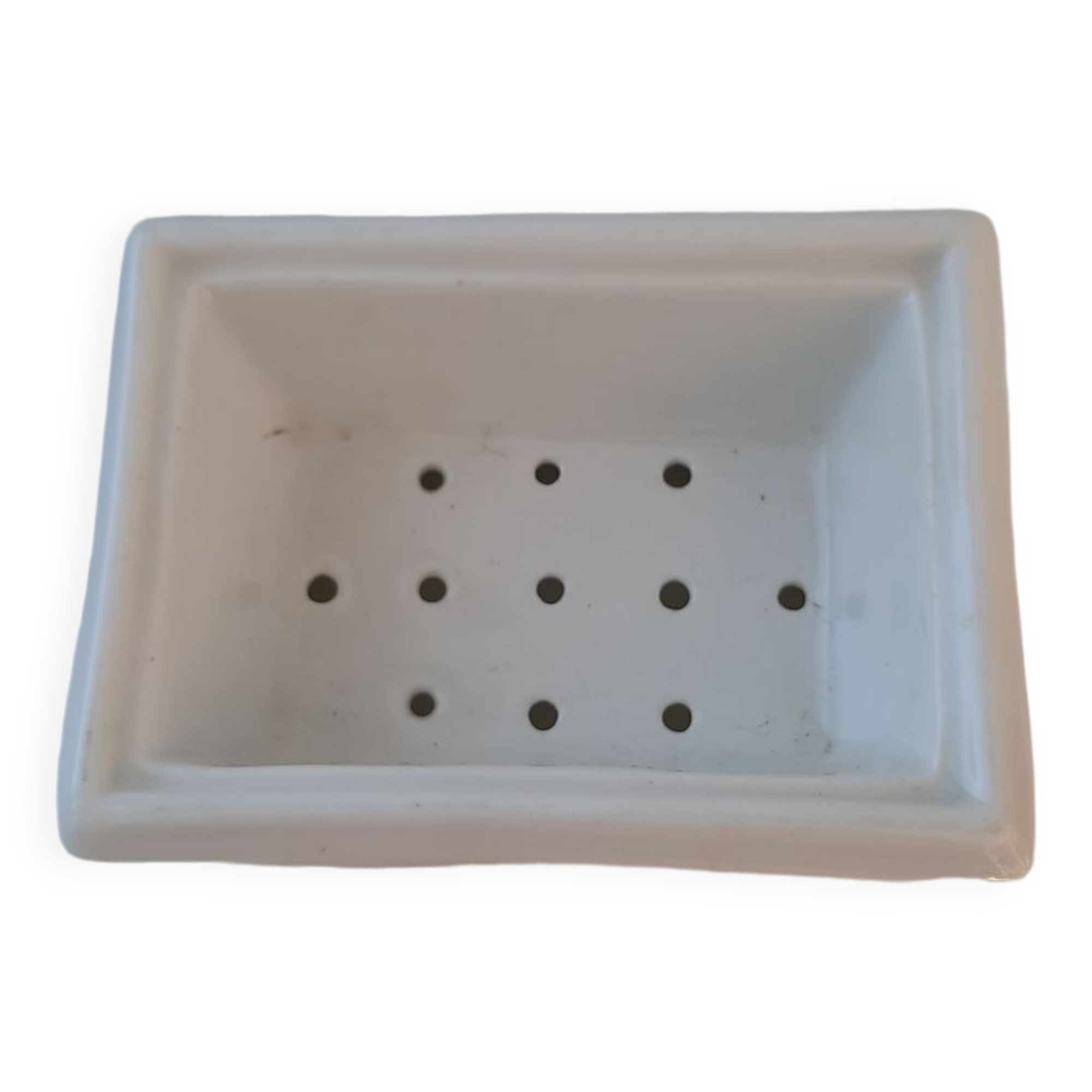 Old white porcelain soap dish