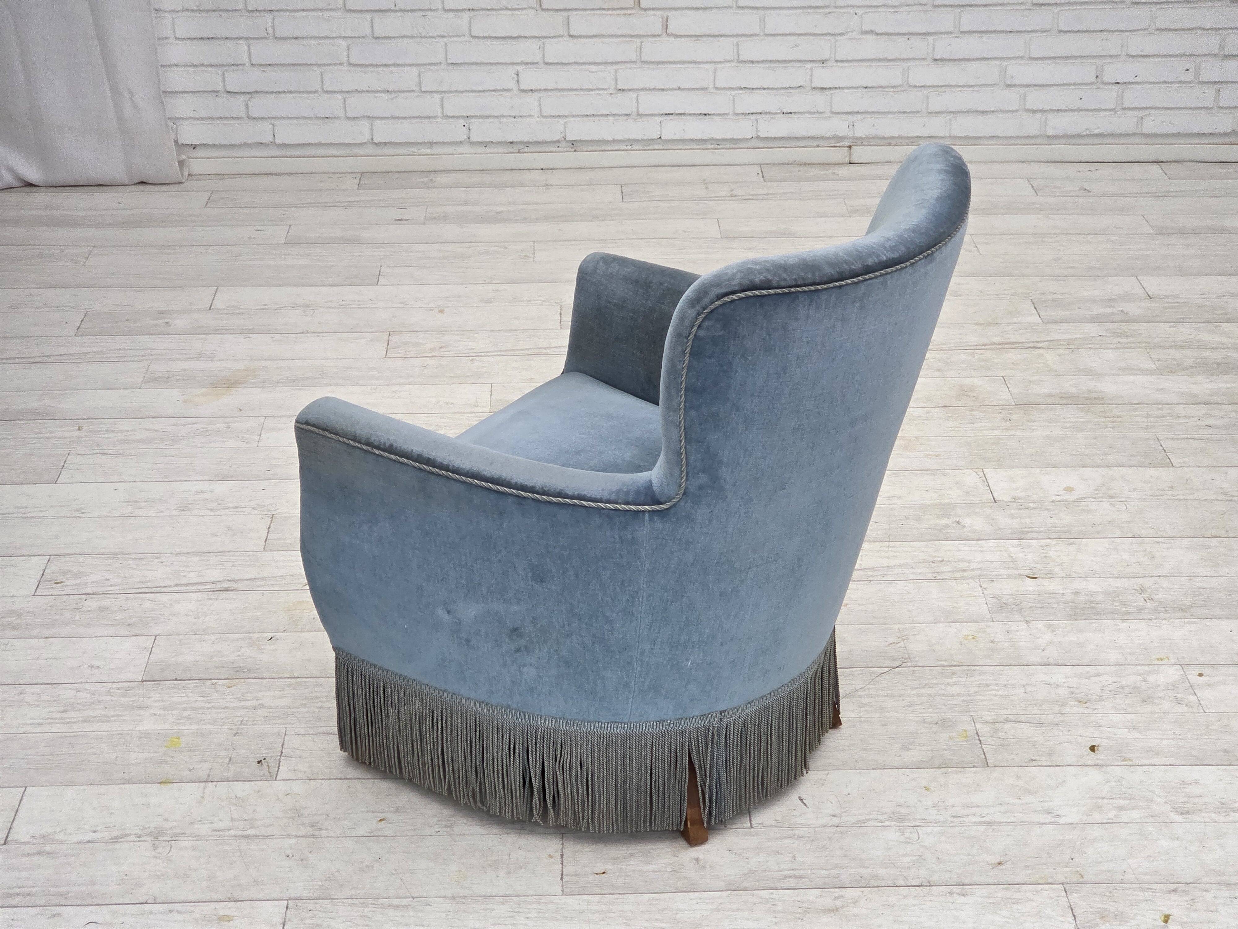 1970s, Danish armchair with footstool, blue furniture velour, oak wood legs