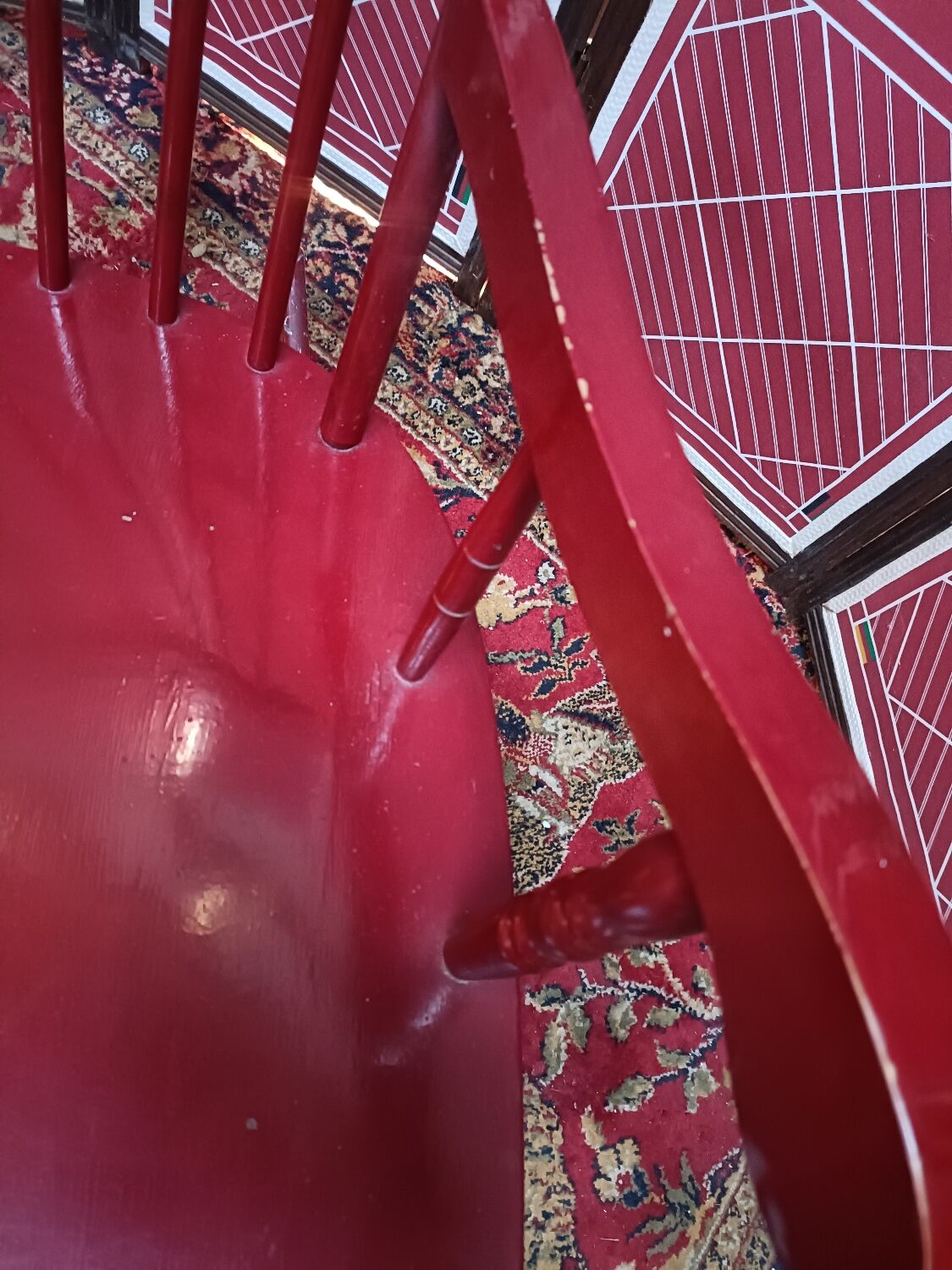 Vintage wooden rocking chair burgundy paint