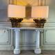 Pair of table lamps, half Corinthian capitals in carved and gilded wood, 18th century