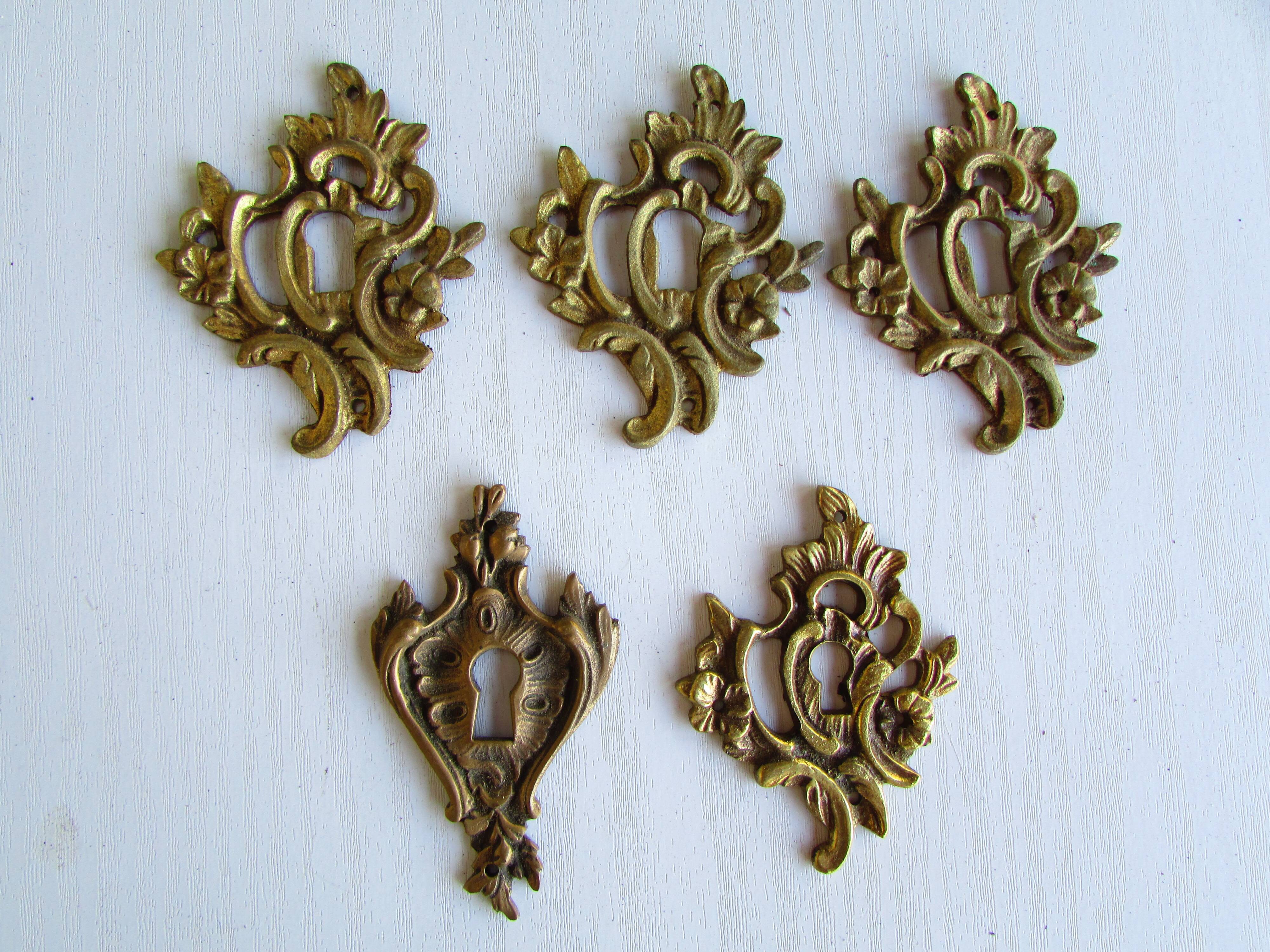 Set of 7 bronze lock entries, for antique furniture