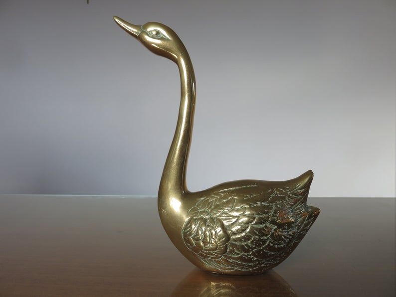 Golden brass swan 70s
