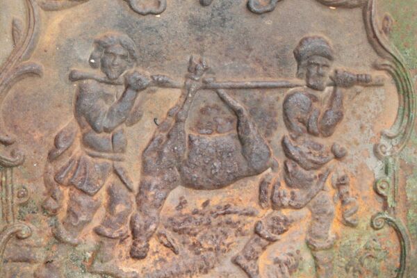 Plaque de cheminée en fonte