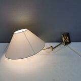 Danish Brass wall lamp with a ‘swivel’ effect.