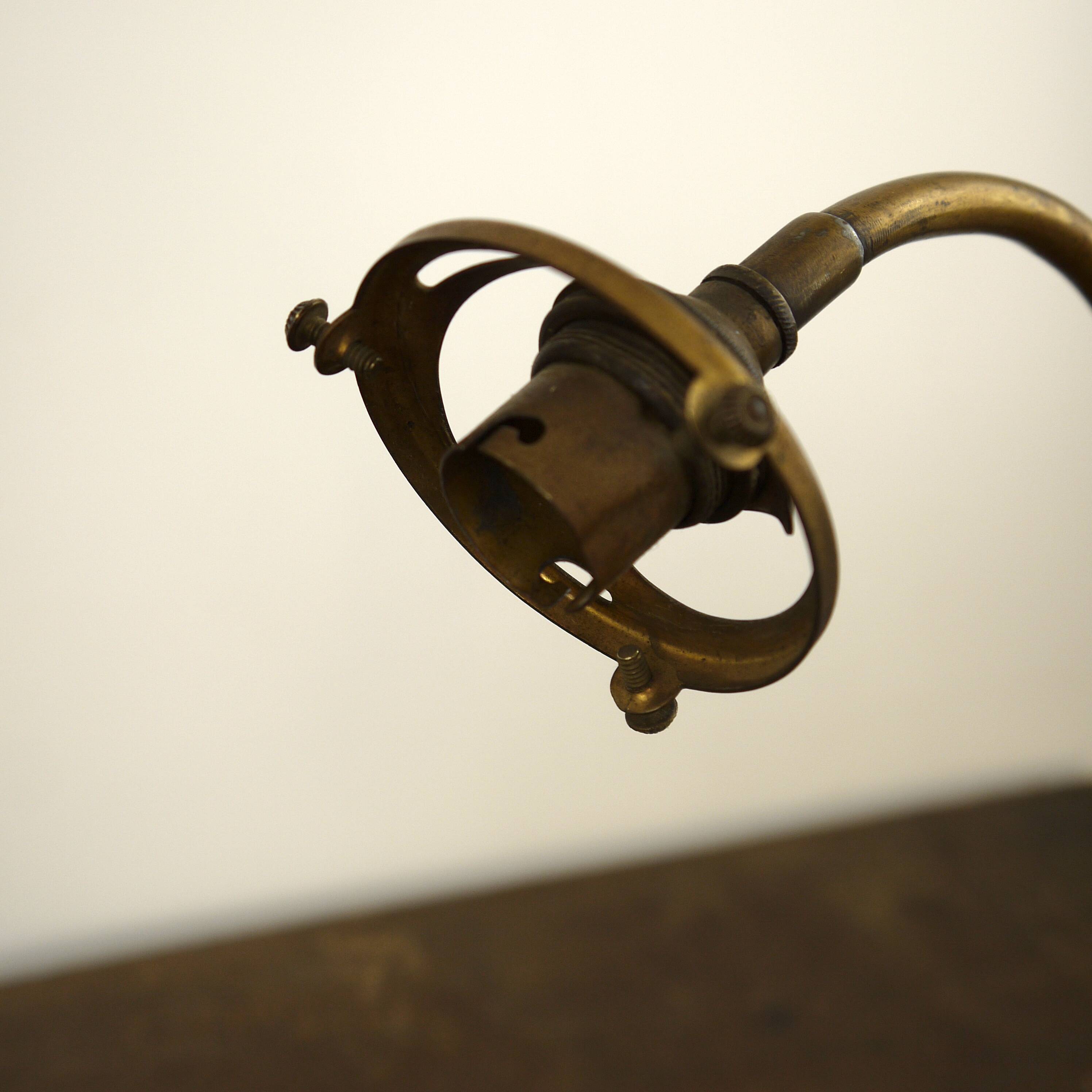 Brass lamp with glass globe