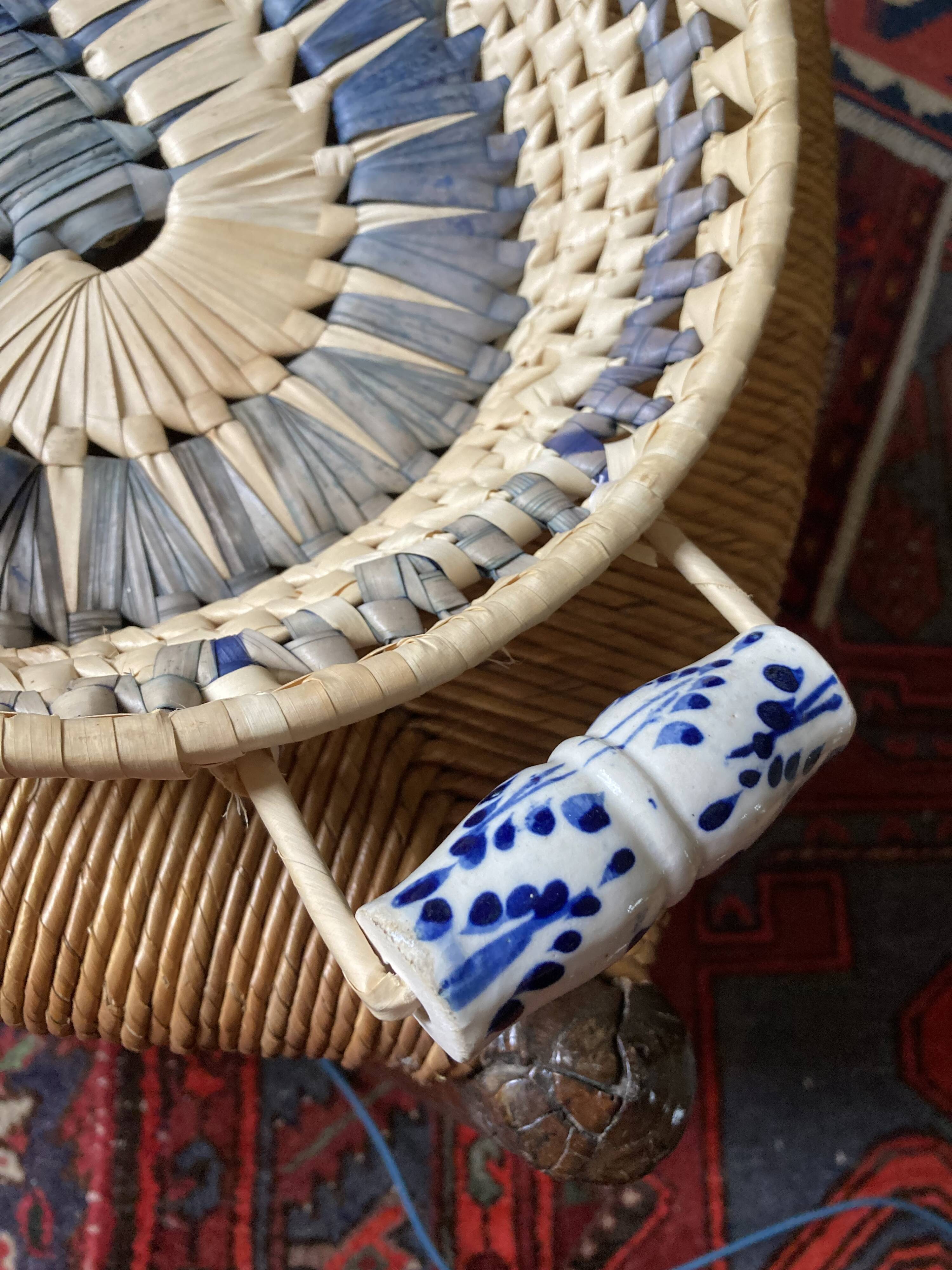Wicker basket and vintage asymmetrical antique ceramic