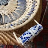 Wicker basket and vintage asymmetrical antique ceramic