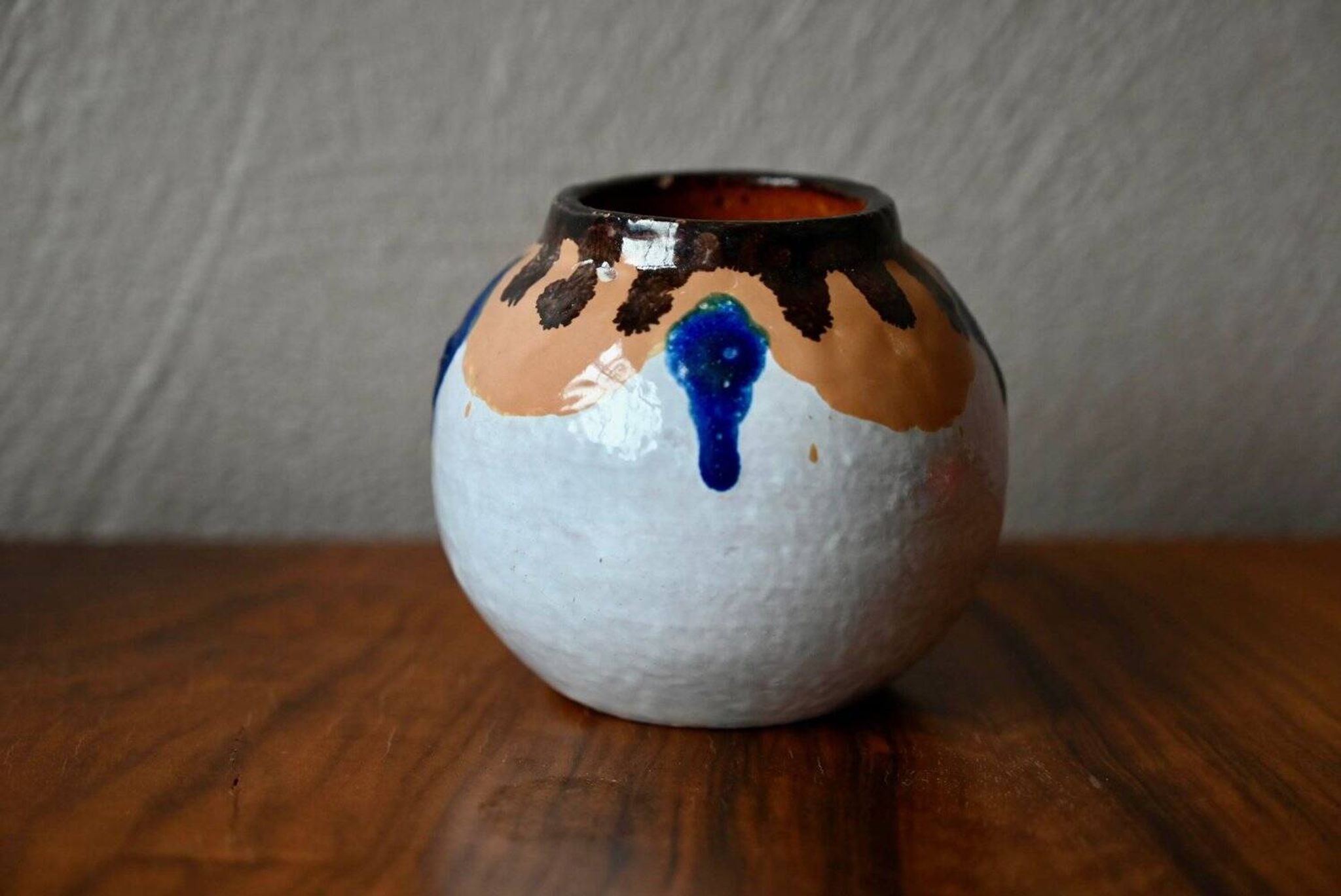 Set of three ethnic glazed terracotta ball vases from the 1970s.