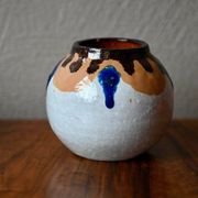 Set of three ethnic glazed terracotta ball vases from the 1970s.