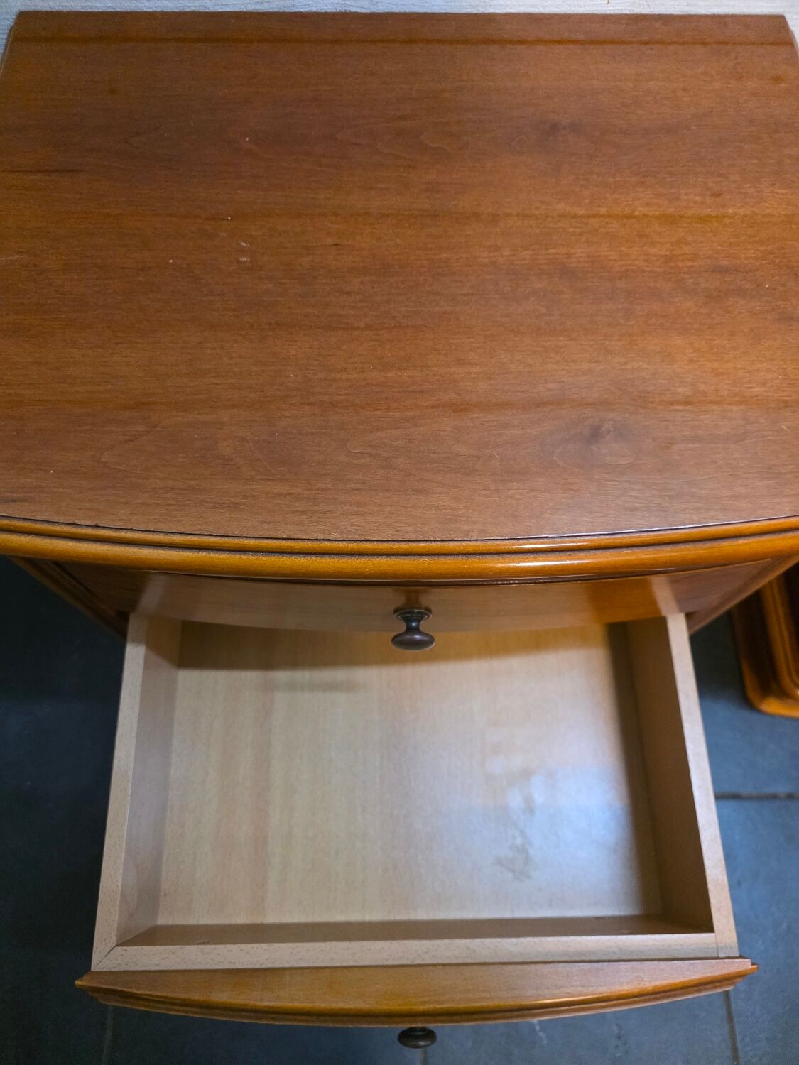 Pair of Louis Philippe style bedside tables in cherry wood.
