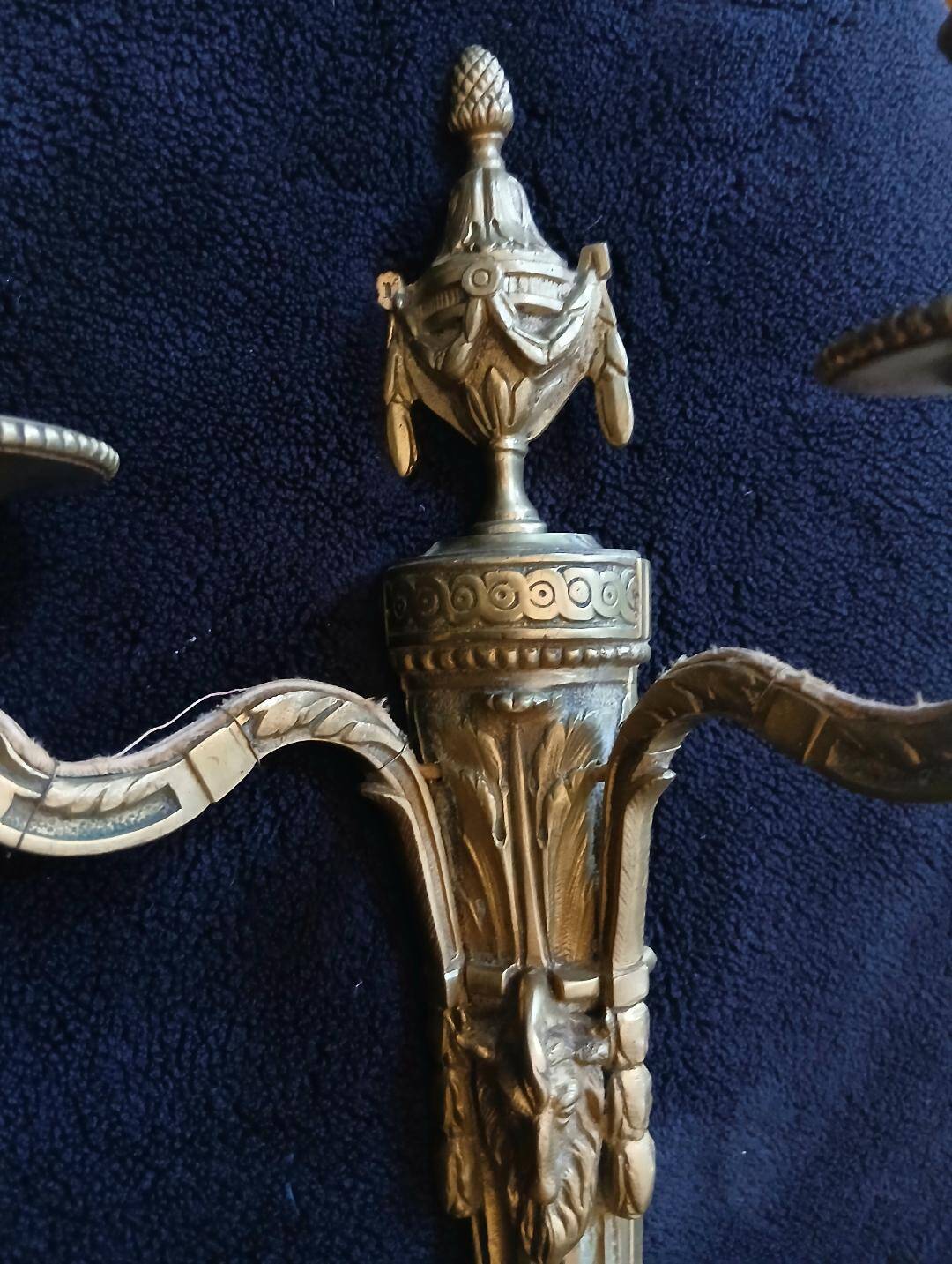 2 or 3 bronze wall lights in the Louis XVI Empire Neoclassical style.