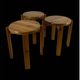 Set of three solid pine stools, 1970s.