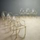 Louis Ghost chairs by Kartell designed by Philippe Starck from the 2000s.