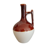 Enamelled pitcher with bicolor collar