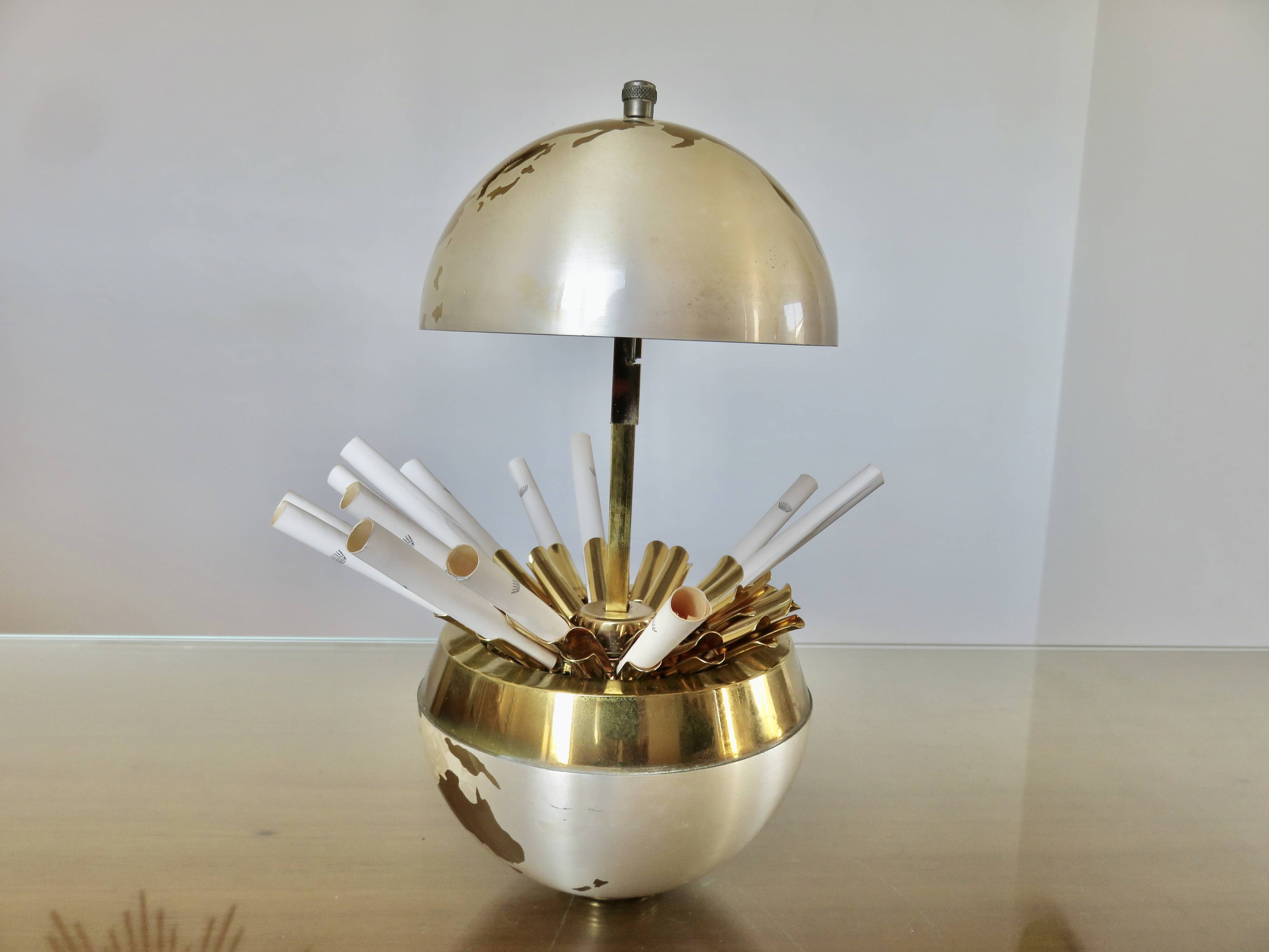 Large terrestrial globe, cigarette dispenser, brass, 1960 - 1970