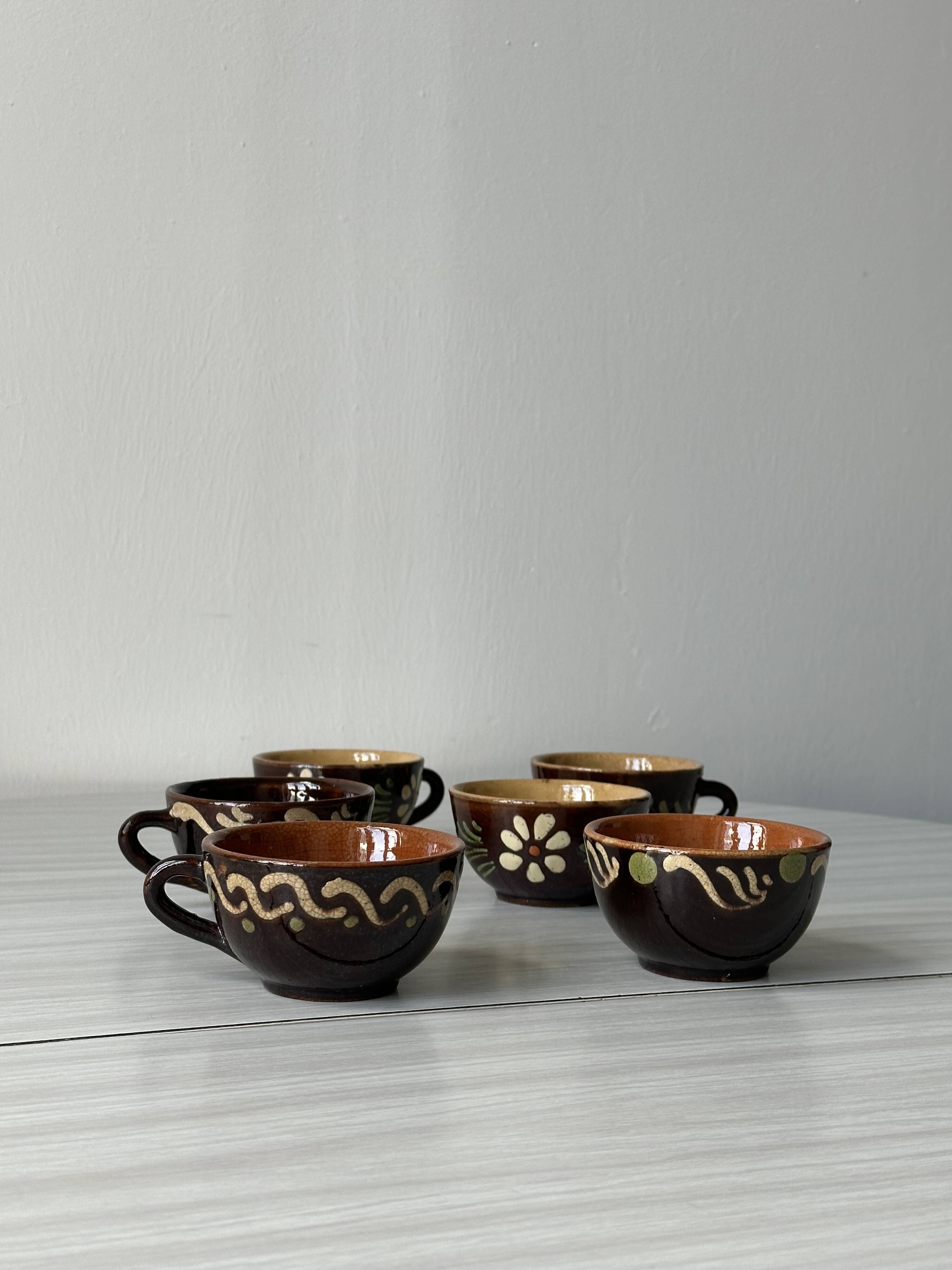 Lot of mismatched Alsatian pottery coffee cups